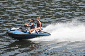 Jet skiers enjoy a beautiful day on Cheat Lake